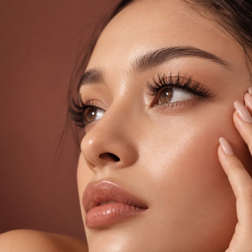 Close-up of a polished, full lash extension set